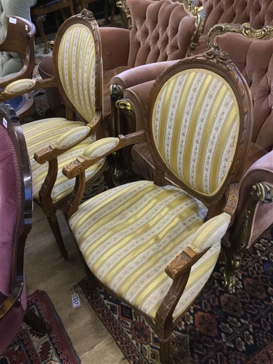 Pair of French style elbow chairs